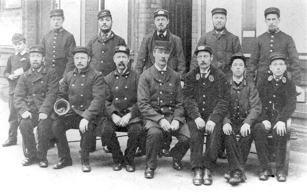 Photograph showing some of the LNWR staff employed at Rugby station at the turn of the century