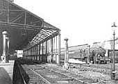 View of the up platform showing the train shed covering both the platform line and the avoiding line