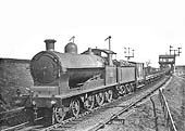 LNWR 4-6-0 19 inch goods class No 1997 is seen at the head of an engineer's train