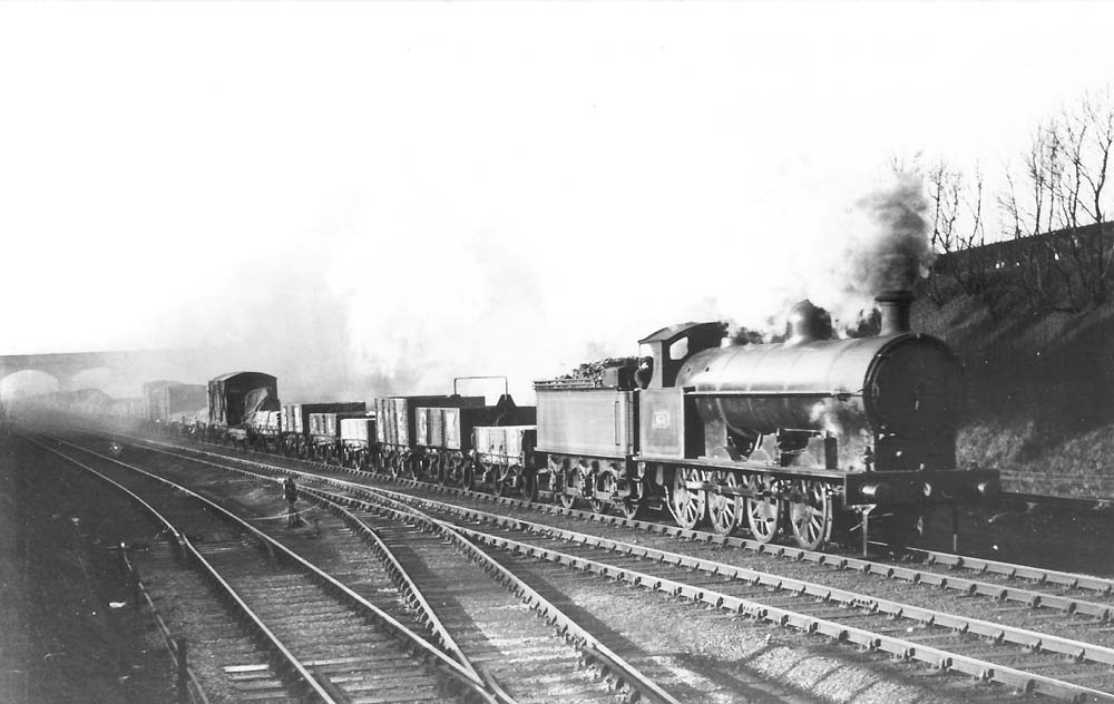 Shilton Station: LNWR 0-8-0 'G1' class No 674 is seen working very hard ...