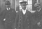 Three members of Three Spires staff pose for the camera, A Dalby, Yard Inspector J Lissaman and E Randle