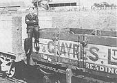 Harry Addison poses on a five-plank open coal wagon stabled on one Three Spires Junction's exchange sidings