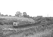 Brush Type 4 1842 with an empty cartic train comes off what became known as the Gosford Green branch on 4th August 1971