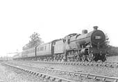 LMS 4P 4-4-0 Compound No 1154 is seen approaching Newbold Troughs whilst at the head of an up express service to Euston