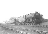 LMS 5MT 4-6-0 'Stanier Black 5' No 5374 pilots LMS 5XP 4-6-0 Jubilee class No 5733 'Novelty' as the latter picks up water at Newbold Troughs