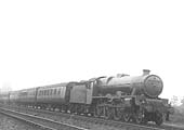 LMS 5XP 4-6-0 Jubilee class No 5557 'New Brunswick' is seen at the head of an up express service after passing Newbold Troughs