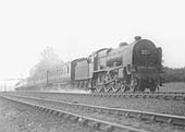 LMS 5XP 4-6-0 Patriot class No 5522 'Prestatyn' is seen picking up water whilst at the head of the up 'Lakes' express