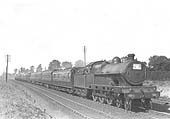 Ex-LNWR 5XP 4-6-0 Claughton class No 5985 is seen at the head of an up express to Euston north of Rugby