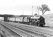 Ex-LMS 4-6-0 Royal Scot Class No 46132 'The King's Regiment Liverpool' is seen on an up express service south of Tamworth