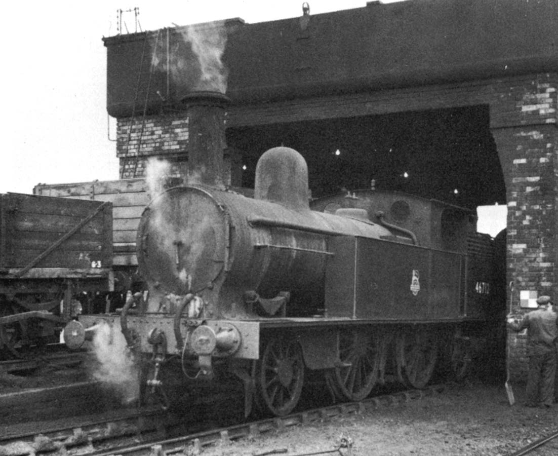 Ex-LNWR 1P 2-4-2T No 46712 is seen on 17th July 1954 standing in Milverton shed's coal hole a matter of days before its withdrawal