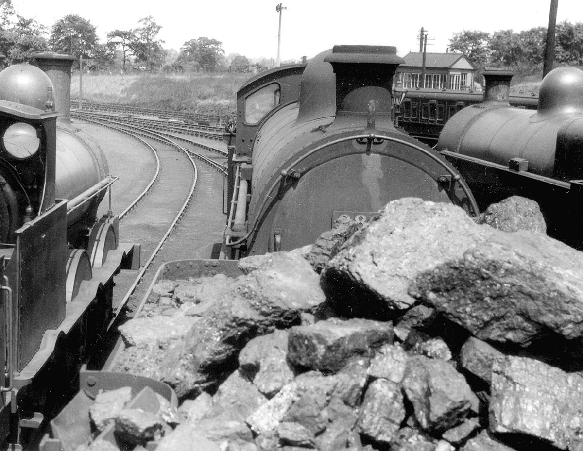 View from the cab of an unknown locomotive along its tender towards the junction of the shed with the Leamington to Coventry line