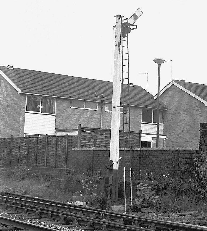 The upper quadrant signal located on the Leamington side of the signal box almost opposite the goods shed