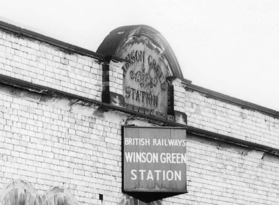 Close up of Winson Green station's original LNWR stone station sign and the later BR version