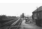 Looking north during the 1930s towards Redditch from the down platform with the goods shed seen on the right