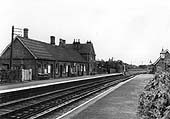 A British Railway's period view looking towards Evesham from the Redditch end of the up platform with the station still looking neat and tidy