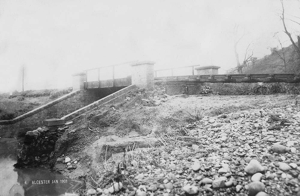 View of one of the flood damaged bridges carrying the line over the River Arrow between Alcester and Wixford in January 1901