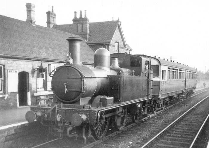 GWR Collett 48xx class 0-4-2T No 4814 with 70 diagram A29 auto trailer No 216 stands in Alcester down platform