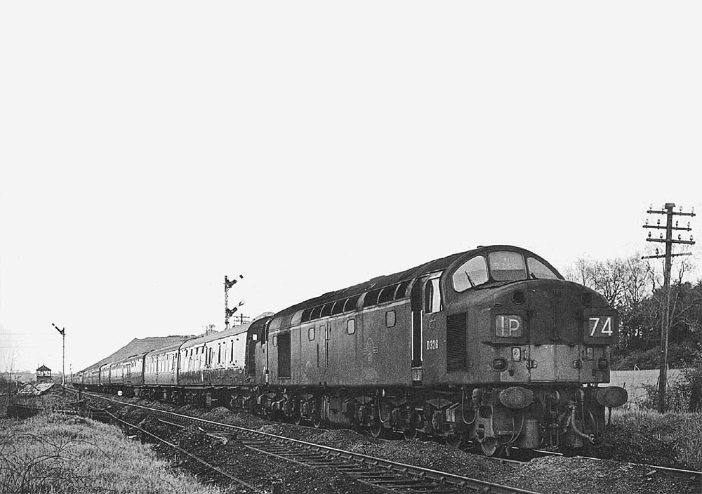 Diesel locomotive D326 is seen on the diverted combined 16:20pm Euston to Blackpool - Holyhead service on Sunday 3rd May 1964