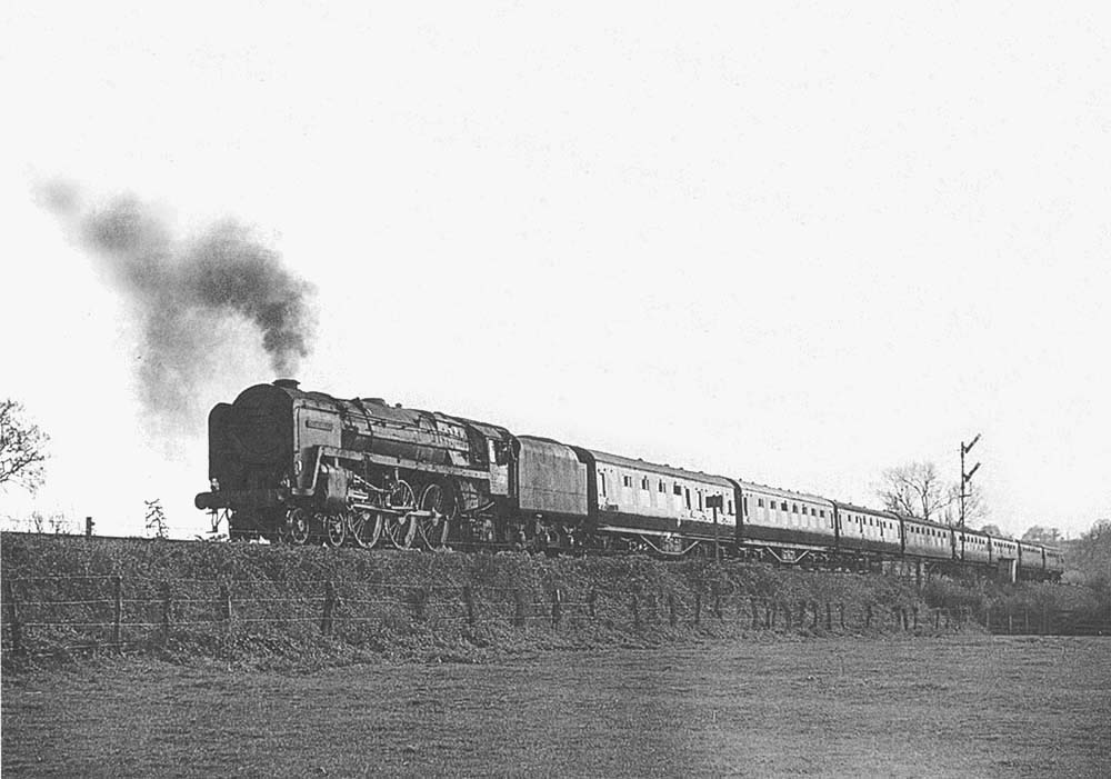 BR Standard 7MT 4-6-2 No 70050 'Firth of Clyde' is seen on a diverted Euston bound express on Sunday 3rd May 1964