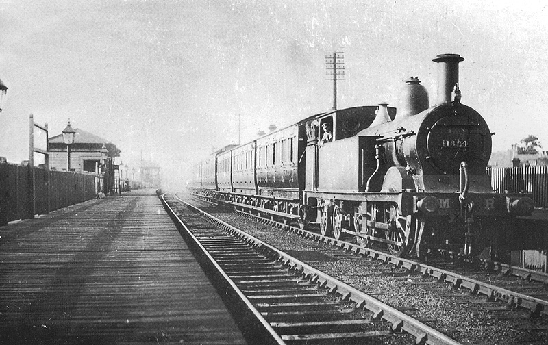 MR 0-4-4T No 1324 heads an up local passenger train comprised of three six-wheel coaches followed by a clerestory circa 1912