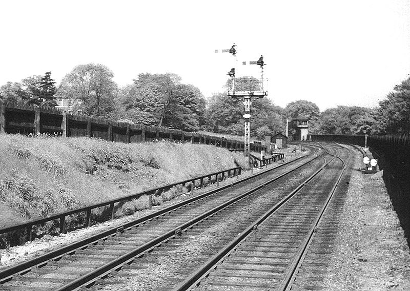 View of the up home signals and Church Road Junction signal box viewed from the Birmingham end of the down platform on 31st May 1955