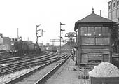 An unidentified ex-LMS 3F 0-6-0 'Large Goods' locomotive passes the second Duddeston Road Junction signal box