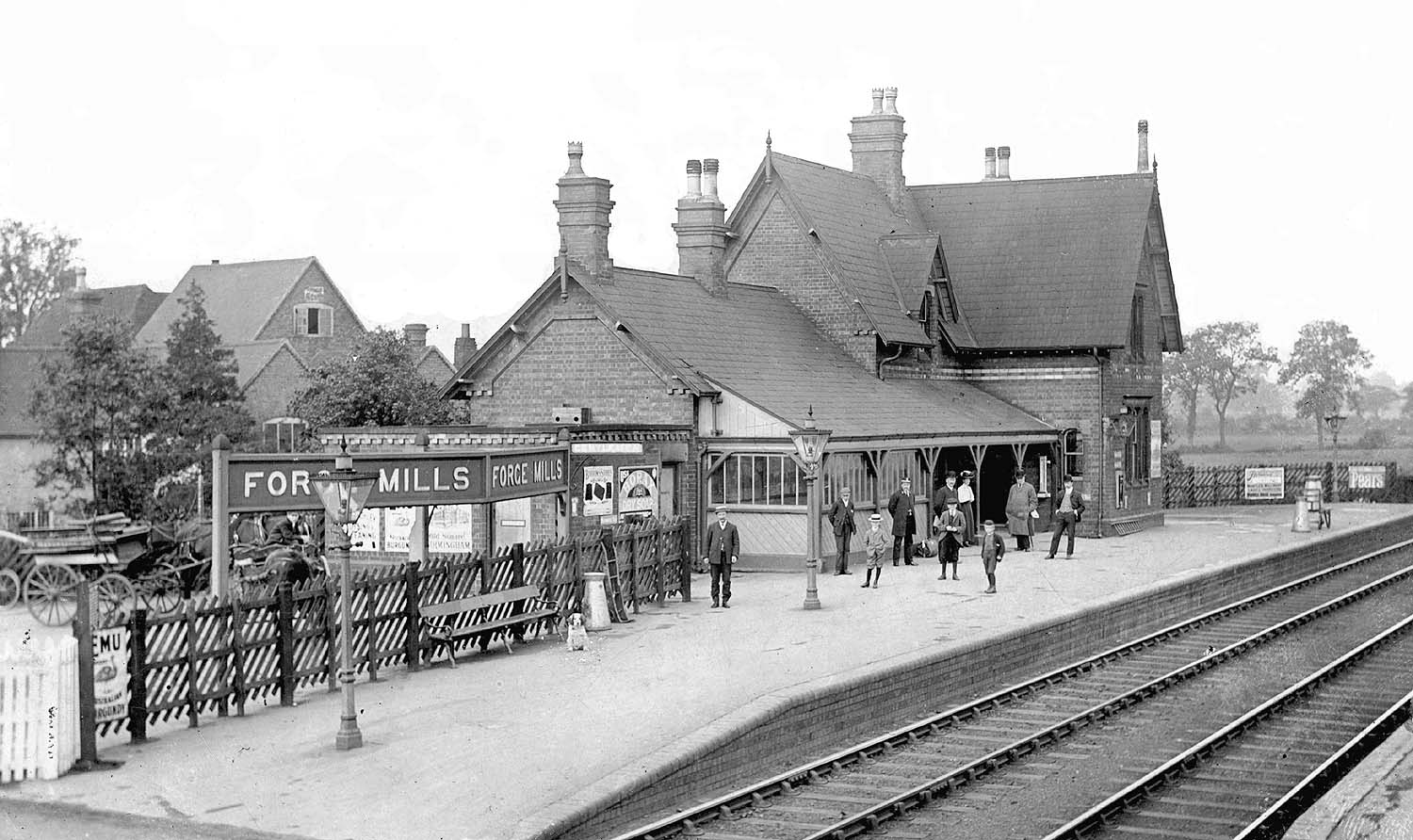 An Edwardian view of Forge Mills station showing the up platform which accommodated the major buildings