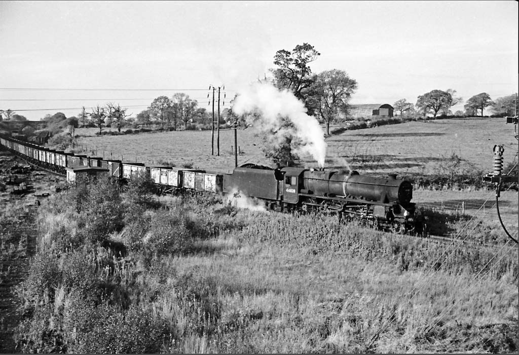 Ex-LMS 4-6-0 5MT No 44828 is seen entering the spur to Hall End & Birch Coppice Colliery from the Kingsbury Branch
