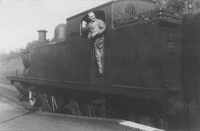 Ex-LT&SR 2P 4-4-2T No 2107 is seen at Kings Heath at the head of a down local passenger service in 1935