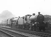 LMS 4-4-0 'Compound' 4P No 1098 pilots LMS 4-6-0 5XP Jubilee No 5659 'Drake' on a twelve coach train in 1937