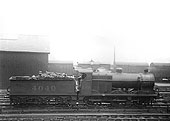 Ex-MR 0-6-0 4F No 4040, a few months after being outshopped, pauses during its duties in the goods yard