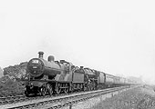 Ex-MR 2P 4-4-0 No 383 doubleheads LMS 5MT 4-6-0 No 5288 on an up express south of Kings Norton