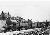 Ex-MR 3P 4-4-0 No 751 on a train with three assorted fitted vehicles behind the tender on 30th June 1926