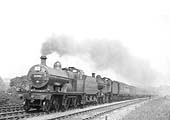 Ex-MR 4-4-0 class 3P No 745 doubleheads ex-MR 4-4-0 Compound No 1001 during the summer of 1937