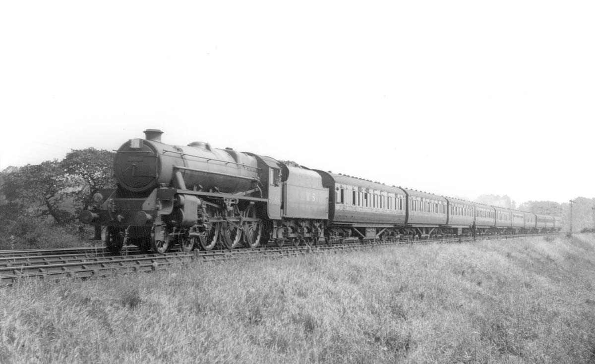 LMS Stanier 4-6-0 5P5F No 5088 heads yet another holiday special on a sunny summers in July or August 1936