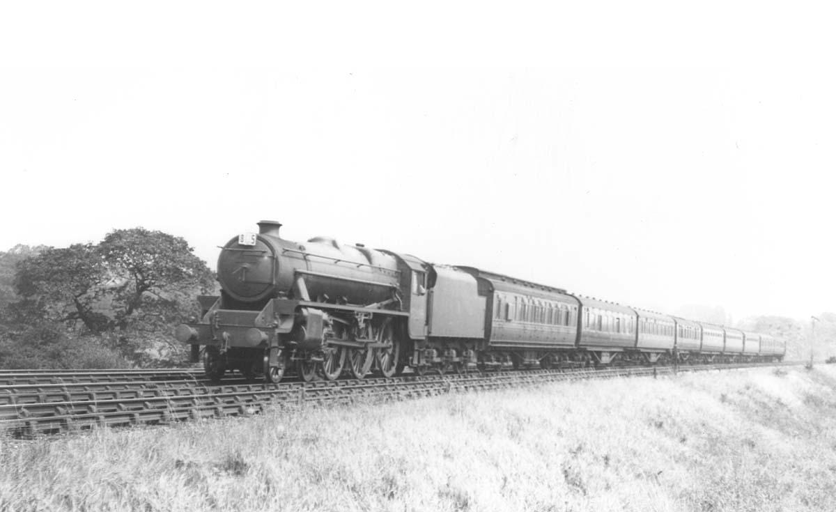 LMS Stanier 4-6-0 5P5F No 5299 heads another holiday special express passenger service in the summer of 1936