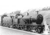 LMS 3P 4-4-0 No 718 stands at the West Suburban Railway up platform at the head of a local train on 13th November 1931