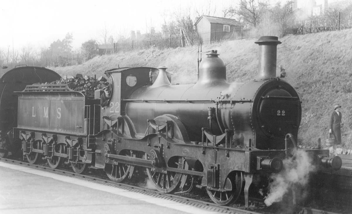 LMSR 1P 2-4-0 No 22 heads a Birmingham bound train standing at Kings Norton station on Saturday 7th November 1931