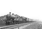 Ex-MR 2P 4-4-0 No 383 doubleheads LMS 5MT 4-6-0 No 5288 on an up express south of Kings Norton