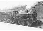 Ex-MR outside curved framed 2-4-0 1P No 2 stands at Kings Norton station on a local Evesham passenger train on 10th March 1932