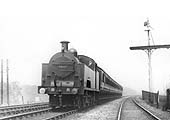MR 0-6-4T 3P 'Flatiron' No 2031 is seen on a local stopping train as it passes some unusual MR signals circa 1911