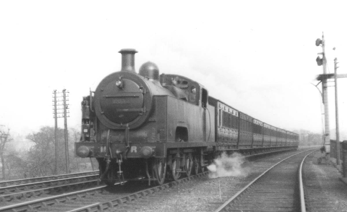 MR 0-6-4T 'Flatiron' No 2035 with Westinghouse equipment fitted to the left of the smokebox on a local pasenger train