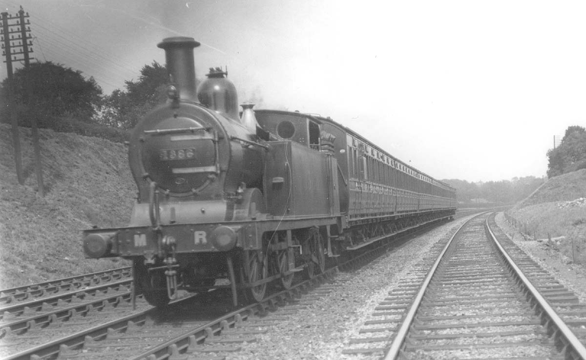 MR 0-4-4T 1P No 1386 is seen running at speed on the fast line at the head of a local passenger service