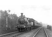 MR Kirtley 1P 2-4-0 No 121, a Saltley shed locomotive, is seen at the head of a down express south of Kings Norton