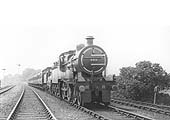 MR 4-4-0 No 509 doubleheads MR 4-4-0 No 126 on an up express train south of Kings Norton on 16th July 1921