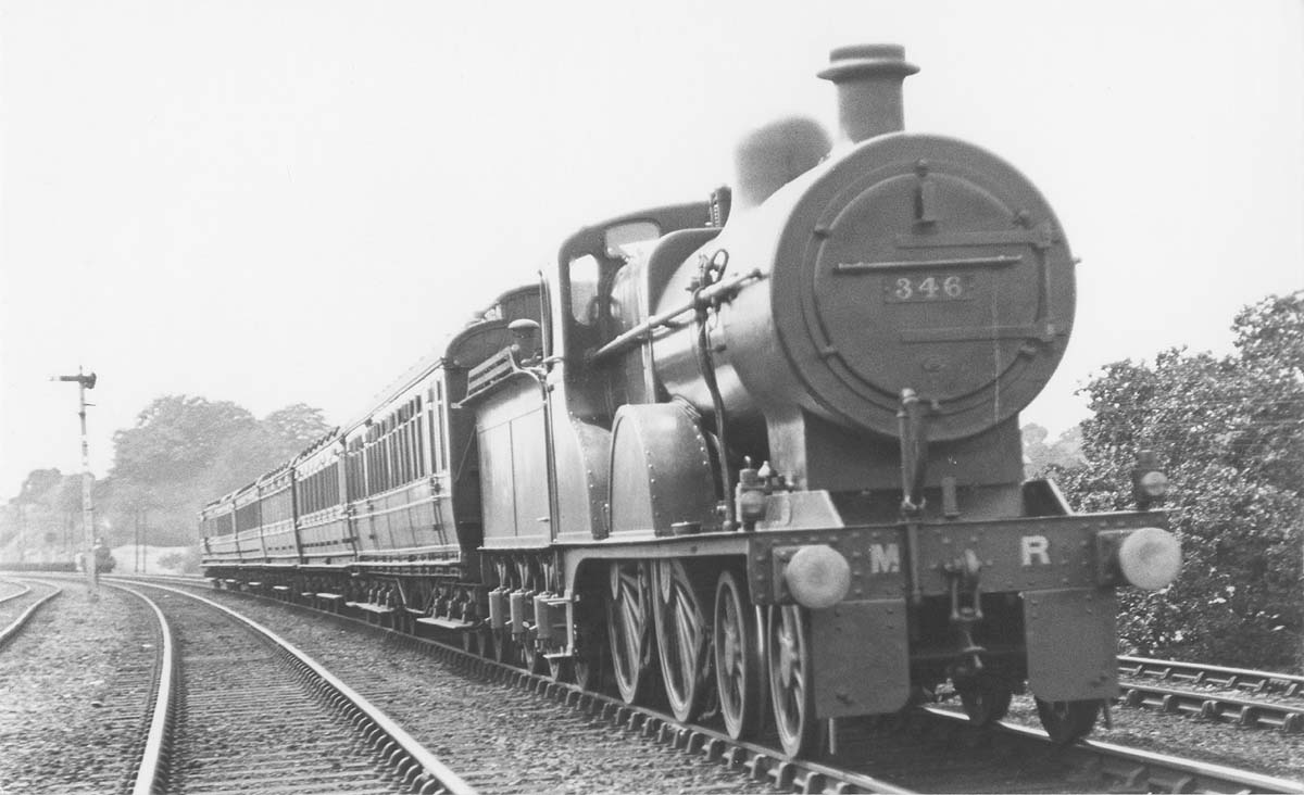 MR 4-4-0 No 346 is on five coach local passenger train having just passed a goods train standing in the refuge siding