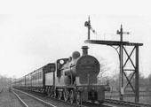 MR 4-4-0 No 432 is seen ghosting past the MR gantry signal at the head of an up express on 15th April 1922