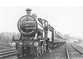 MR 4-4-0 No 488 is seen on a down express passenger service having just passed the carriage sidings on 16th July 1921