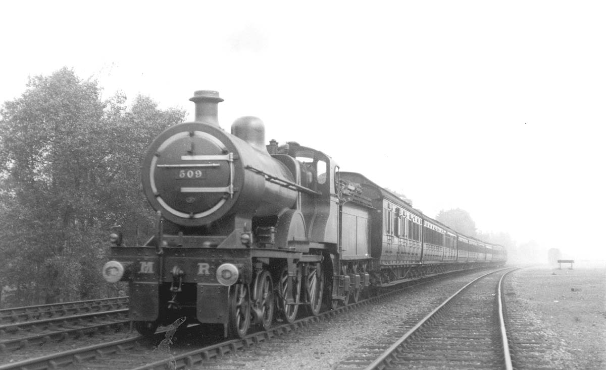 MR 4-4-0 2P No 509 is at the head of an express service near Kings Norton on 17th September 1921