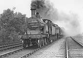 MR 'Single' 4-2-2 1P No 662, allocated to Saltley shed, is seen piloting MR 4-4-0 No 520 on a down August 1921